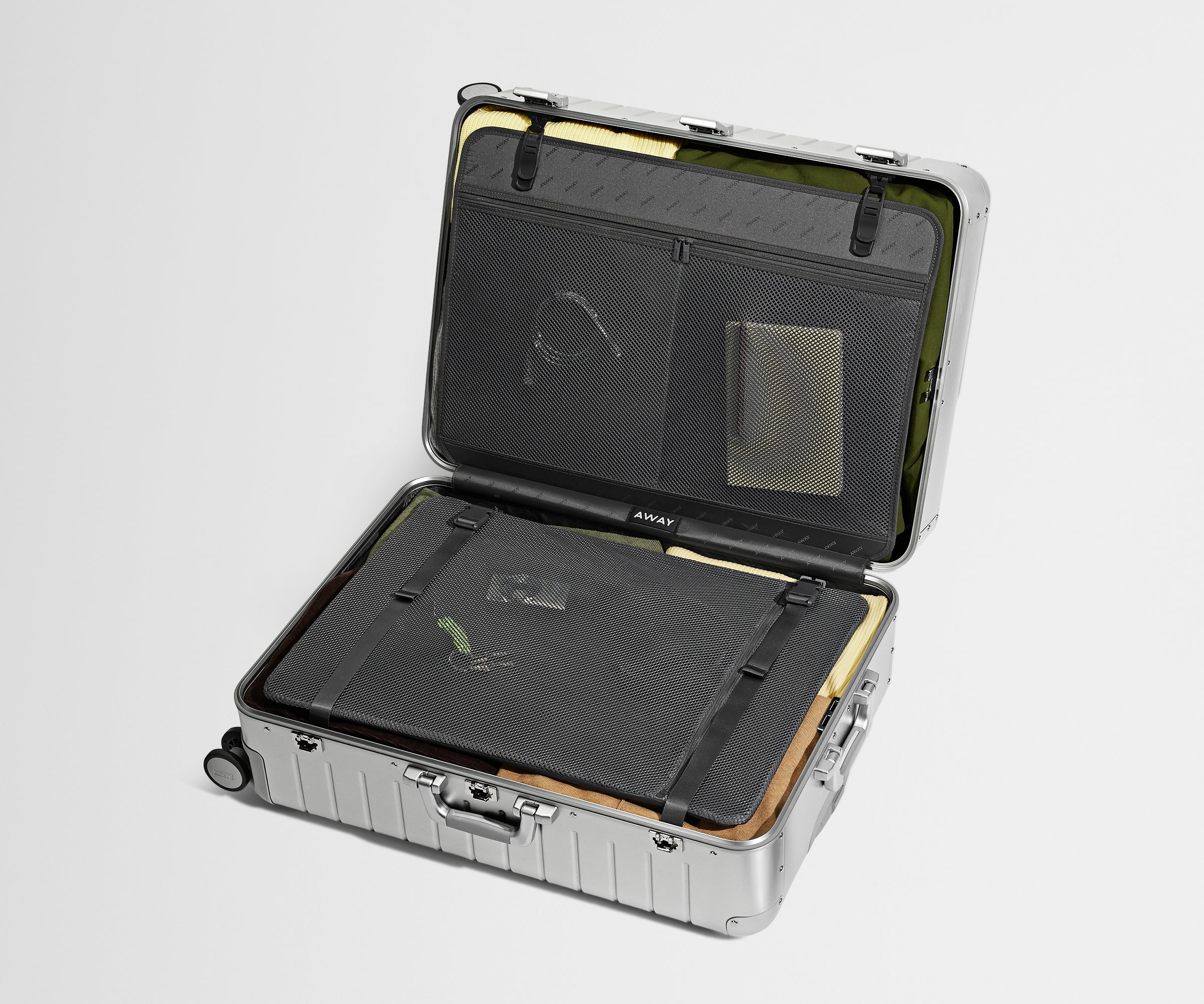 Compression pad and interior organization system of the Large: Aluminum Edition in Silver