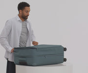 Video of a person packing their Softside Large suitcase